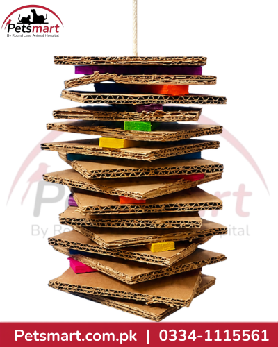 Hanging bird shredding toy made with layered corrugated cardboard and coloured wooden pieces