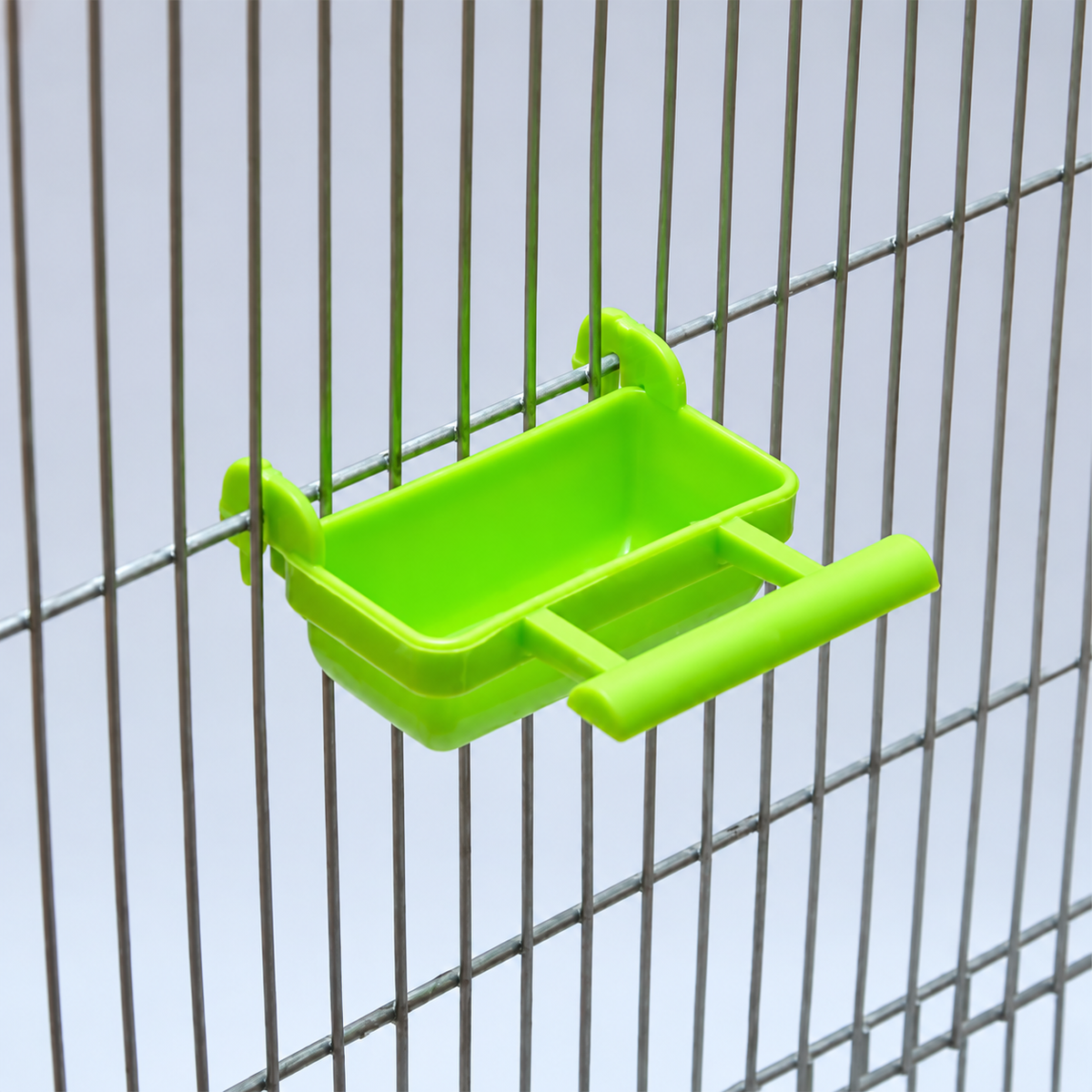 Assorted color bird soft food bowls with perch