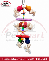Birdie Bella hanging bird toy with colourful wooden pieces rope knots beads and bell