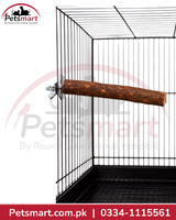 A wooden bird perch attached to a black metal wire cage, shown against a white background with Petsmart branding and contact details.