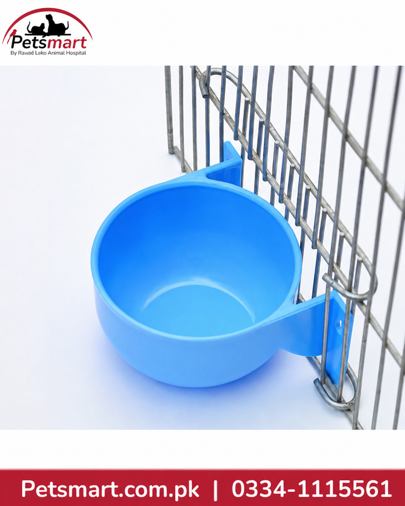Blue round bird water bowl attached inside a bird cage