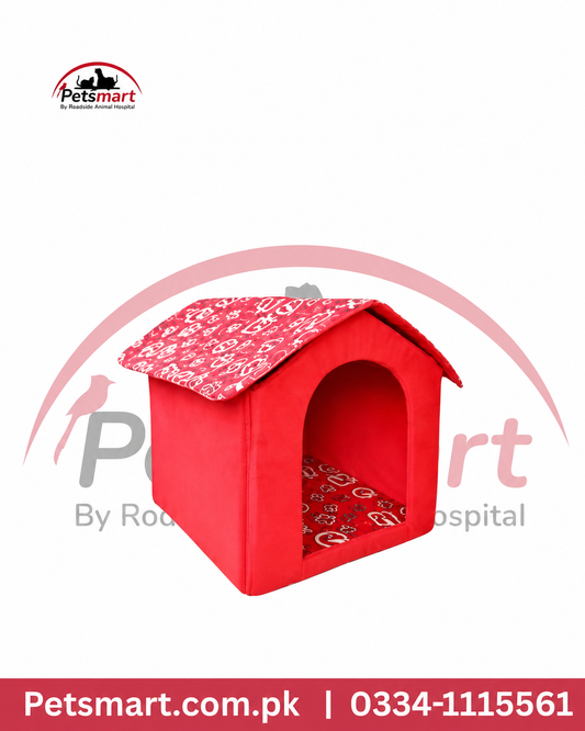 Red cat house with printed roof and arched entrance for indoor sleeping