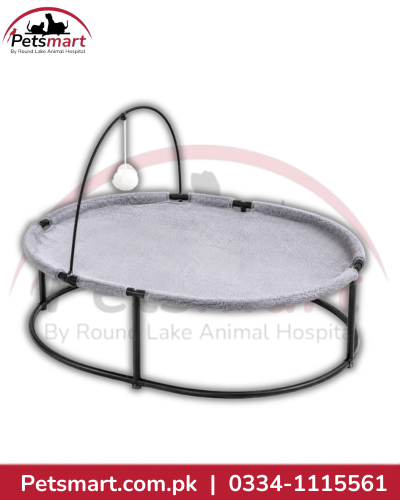 Grey elevated pet bed with black frame, hanging plush ball and small dog, measuring 63 by 46 by 47 cm