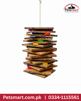 Hanging bird shredding toy made with layered corrugated cardboard and coloured wooden pieces