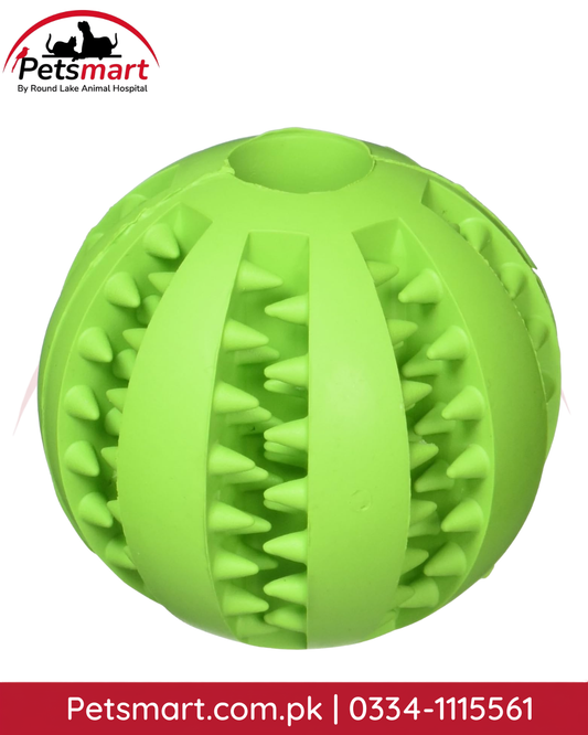Green interactive dog treat ball toy with textured rubber surface for food dispensing and chewing