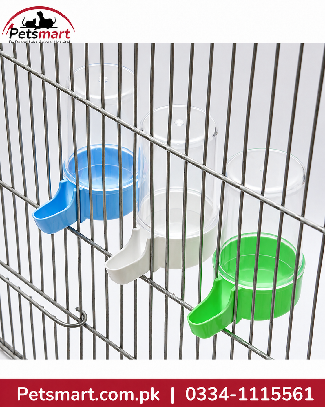 Three clear plastic pet water bottles with blue, white, and green dispensers mounted on a metal wire cage. The Petsmart logo is visible in the top left corner, and a red contact banner is at the bottom.