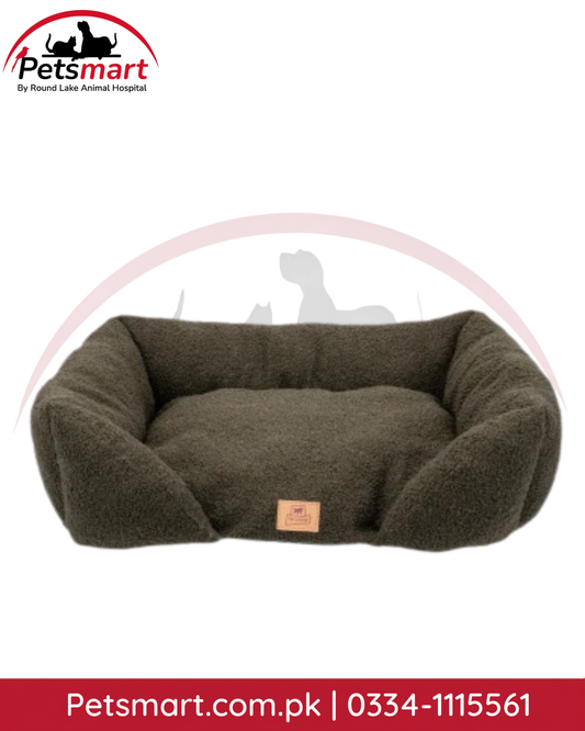 Medium plush pet bed with raised cushioned sides for cats and small-to-medium dogs