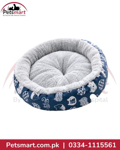 medium round blue and grey cushioned pet bed with raised sides for cats and dogs