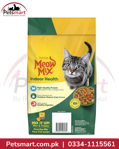 A bag of Meow Mix Indoor Health cat food by Petsmart, featuring a yellow and green package design with an image of a gray tabby cat and a bowl of wet and dry cat food. The Petsmart logo is visible in the top left corner.