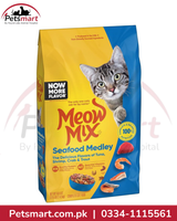 A bag of Meow Mix Seafood Medley cat food by Petsmart, featuring a yellow and blue package design with a tabby cat illustration and food pieces shown on the front.