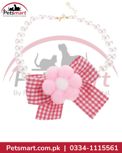 Pearl-style cat necklace with white beads pink gingham flower and gold-tone clasp