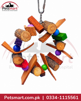 Round About hanging wooden bird toy 19 by 19cm with colourful blocks beads and natural wood pieces