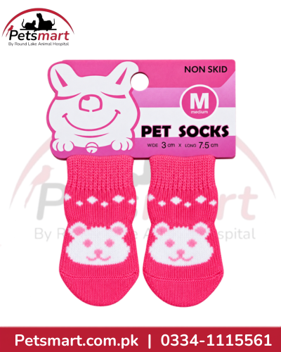 Small pet socks with non-slip paw print grip for indoor use