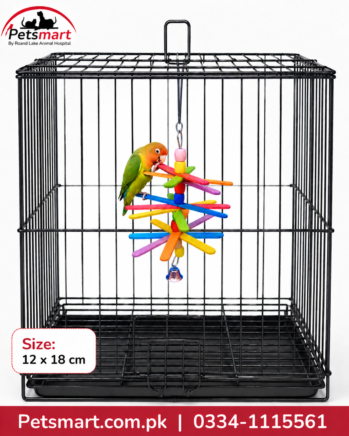 A black metal bird cage with a hanging colorful parrot toy, featuring a green and orange parrot perched on the toy. The image includes a Petsmart logo in the top-left corner and a size label indicating 12 x 18 cm.